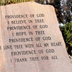 Providence of God scripture in stone on the university's campus
